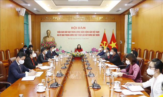 Vietnam, Laos exchange mass mobilization work